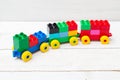 Multicolored train of colored plastic blocks. Early learning. Royalty Free Stock Photo