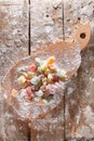 Multicolored Turkish Delight, carefully laid out on the board in the shape of a pear. Delicious oriental sweets