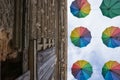 Multicolored umbrellas hanging at historic facade