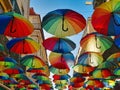 Multicolored umbrellas Rainbow colored umbrellas hang along the street in Lisbon, Portugal. LGBTQ community concept