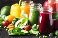 Multicolored vegan vegetable juices and smoothies from tomato, carrot, pepper, cabbage, spinach, beetroot in glass bottles on Royalty Free Stock Photo