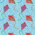 Multicolored vibrant kites watercolor seamless pattern on a blue with rainbow polka dots