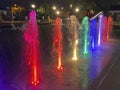 Multicolored Water Fountain Jets at Night Royalty Free Stock Photo