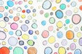 Multicolored watercolor hand drawn circles pattern. Round shapes ornament. Colored painted bubbles design