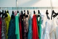 Multicolored womens clothing hanging on the hanger horizontal Royalty Free Stock Photo