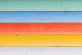 Multicolored wooden background texture. Close up of colorful fence Royalty Free Stock Photo