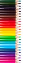 Multicolored wooden pencils in rainbow shade in order on white isolated background mock up, vertical, high quality photo Royalty Free Stock Photo