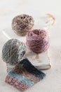 Multicolored yarn made of natural wool for knitting. Tweed yarn in tangles. Tweed. The concept of a hobby. Background