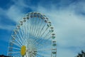 Multicolour ferris wheel on blue sky background. Copy space, street photography Royalty Free Stock Photo