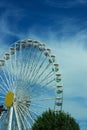 Multicolour ferris wheel on blue sky background. Copy space, street photography Royalty Free Stock Photo