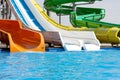 Multicoloured big water slide in the public swimming pool.