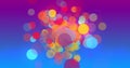 Multicoloured circles moving and multiplying to fill a graduated blue background Royalty Free Stock Photo