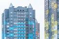 Multicoloured high-rise residential buildings in affluent areas. Multi-apartment multi-storey building with a multicolored facade Royalty Free Stock Photo