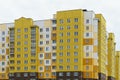 Multicoloured high-rise residential buildings in affluent areas. Multi-apartment multi-storey building with a multicolored facade Royalty Free Stock Photo