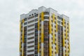 Multicoloured high-rise residential buildings in affluent areas. Multi-apartment multi-storey building with a multicolored facade Royalty Free Stock Photo