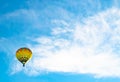 Multicoloured Hot air ballon and clouds Royalty Free Stock Photo