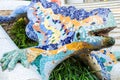 Multicoloured mosaic dragon fountain in the Park Guell. Barcelona, Spain