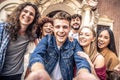 Multicultural best friends having fun taking group selfie portrait outside Royalty Free Stock Photo