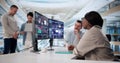 Multicultural Data Analyst Using Predictive Analytics Royalty Free Stock Photo