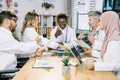 Multicultural doctors sharing with knowledges during meeting Royalty Free Stock Photo