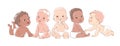 Multicultural group of cute little little baby boys and baby girls in a diapers sitting on a white Royalty Free Stock Photo