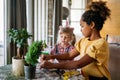 Multicultural group of kids with creative handicraft.Children diversity happiness education concept. Royalty Free Stock Photo