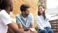 Multicultural happy people laughing talking at reunion meeting on terrace Royalty Free Stock Photo