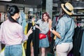 Multicultural hipster girls choosing clothes in boutique Royalty Free Stock Photo