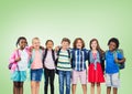 Multicultural School kids in front of green background Royalty Free Stock Photo