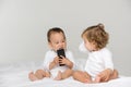 multicultural toddlers with digital smartphone