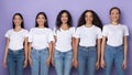 Multicultural Young Ladies Standing Together Over Purple Background
