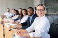 Multiethnic Business People Sitting Having Corporate Meeting In Office Royalty Free Stock Photo