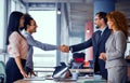 Multiethnic business teams at meeting room shaking hands. Royalty Free Stock Photo