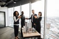 Multiethnic businesspeople, real estate, agents, developers, handshake after successful deal Royalty Free Stock Photo