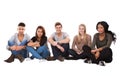 Multiethnic college students sitting in a row Royalty Free Stock Photo