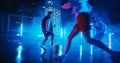 Multiethnic Diverse Friends Playing Soccer Outside on Rooftop Urban City Spot with Neon Lights After