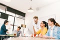Multiethnic diverse group of people at work. Creative team, casual business coworker, or college students in brainstorm meeting Royalty Free Stock Photo