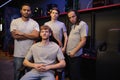 Multiethnic gamer team in grey t