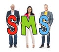 Multiethnic Group of People Holding Letter SMS Concept Royalty Free Stock Photo