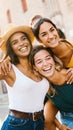 Multiethnic group of three happy young women having fun on summer vacation Royalty Free Stock Photo