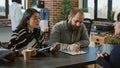 Multiethnic group of workers talking to candidate at recruiting interview Royalty Free Stock Photo