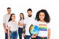 multiethnic group of young people standing behind african american woman with lgbt sign on t-shirt holding globe isolated Royalty Free Stock Photo