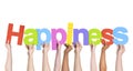 Multiethnic Hands Holding Text Happiness Royalty Free Stock Photo