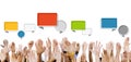 Multiethnic Hands Raised with Speech Bubbles Royalty Free Stock Photo