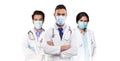 Multiethnic Medical Team In Uniform Standing Isolated Over White Background Royalty Free Stock Photo