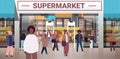 multiethnic people group mix race men women customers crowd near modern supermarket horizontal