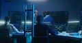 Team of IT technical specialists and software programmers work in monitoring office Royalty Free Stock Photo