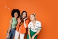 Multiethnic and teen girlfriends in stylish Royalty Free Stock Photo