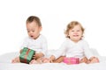 cute multiethnic toddlers with wrapped gifts