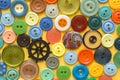 Multifarious buttons for clothes on yellow Royalty Free Stock Photo